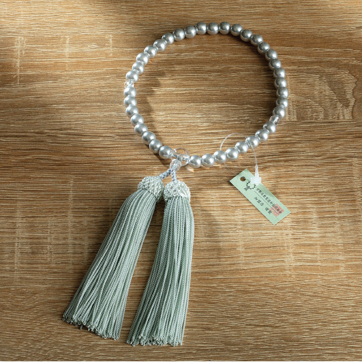 【念珠】再生グレーパール片手7mm P仕立 人絹頭房グレー　SN011